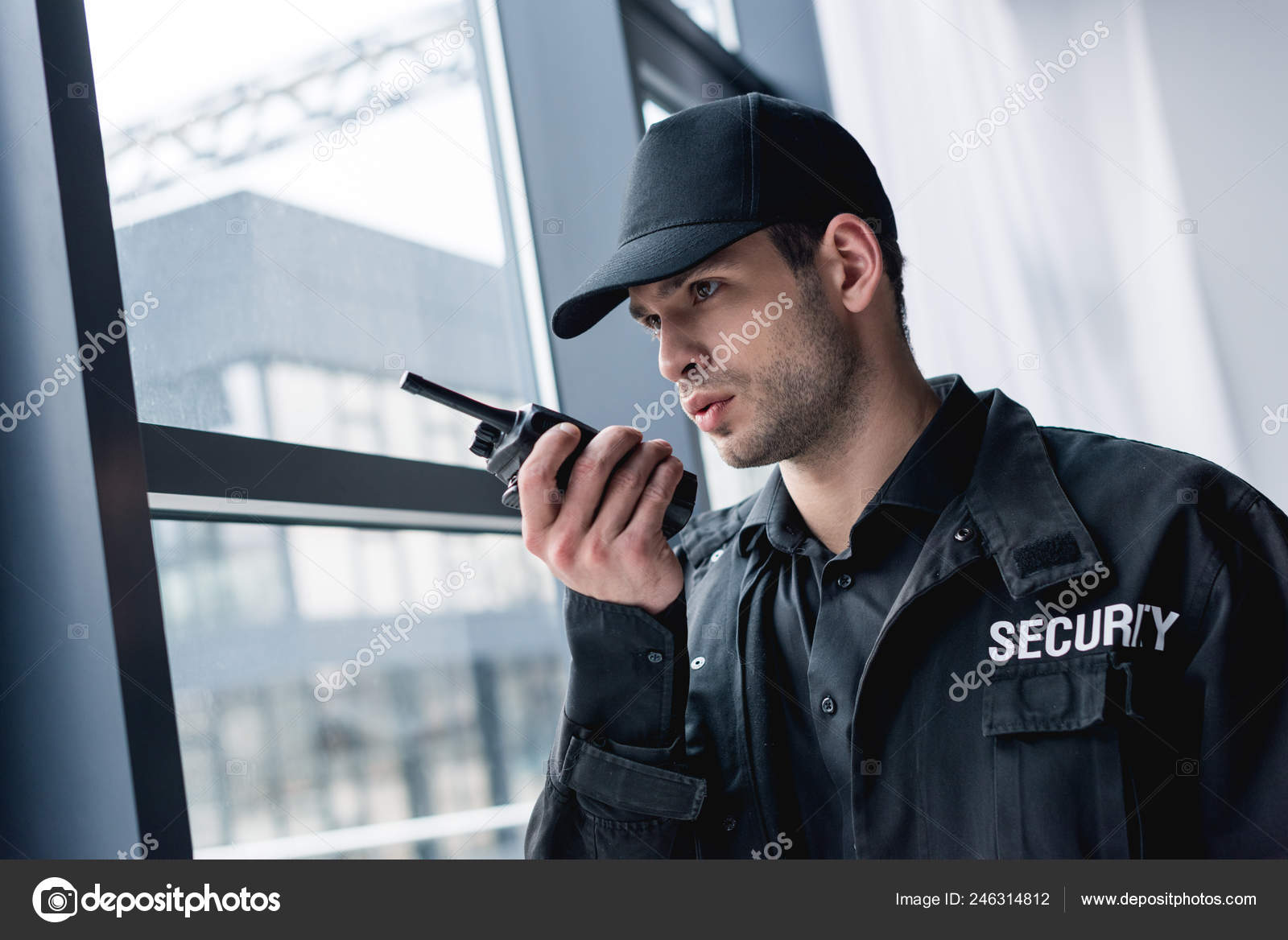 depositphotos_246314812-stock-photo-cropped-view-guard-uniform-talking